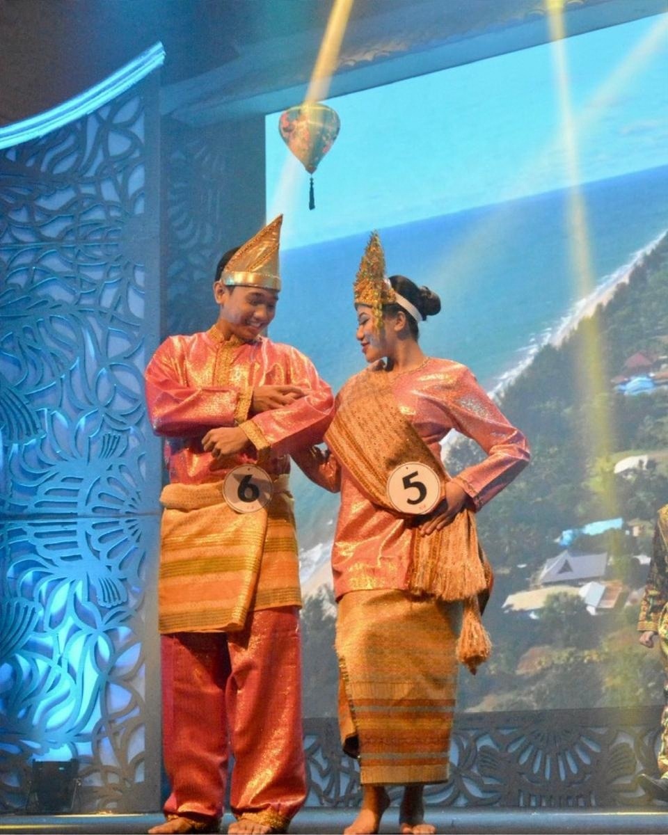 On stage in traditional dress