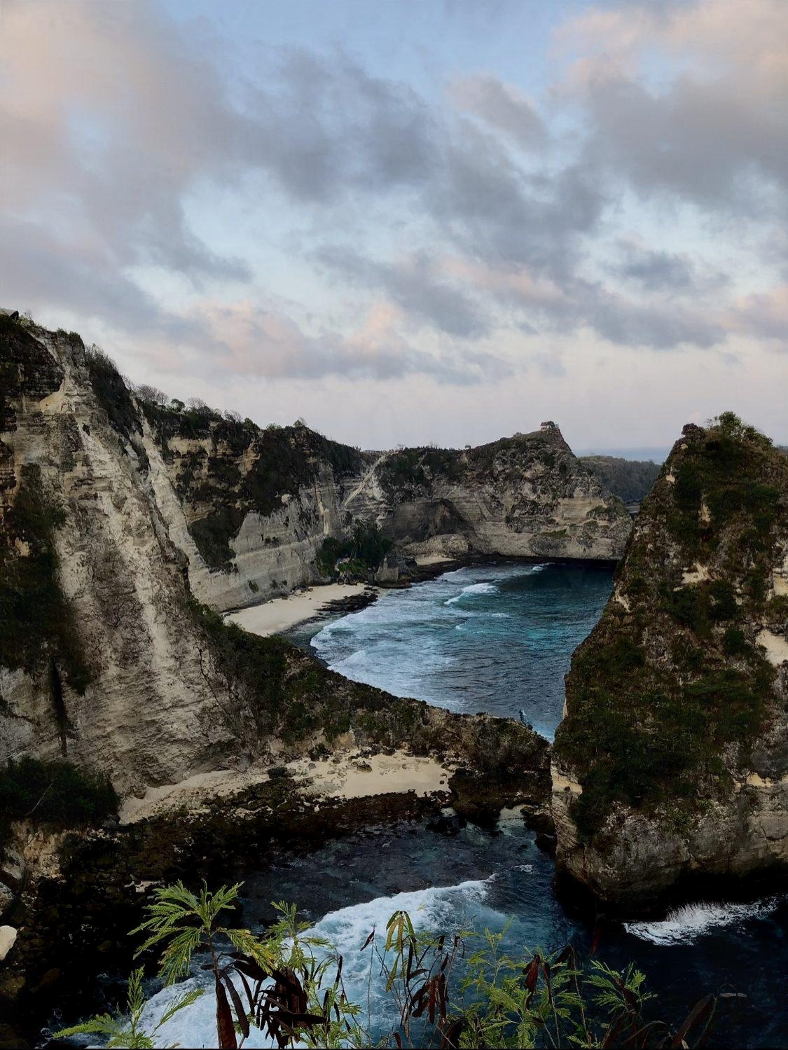 Cliffs and a turquoise bay on Nusa Penida