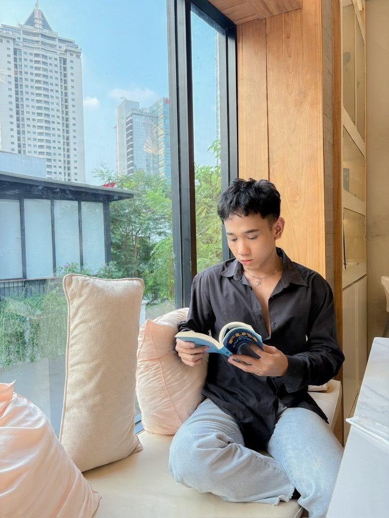 Reading by a big window
