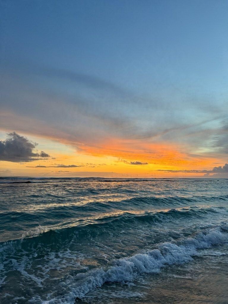 Sunset over the waves